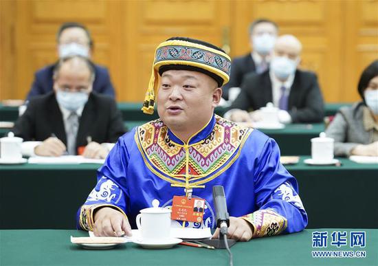  5月24日，全國人大代表宋慶禮參加湖北代表團的審議并發(fā)言。新華社記者 黃敬文 攝